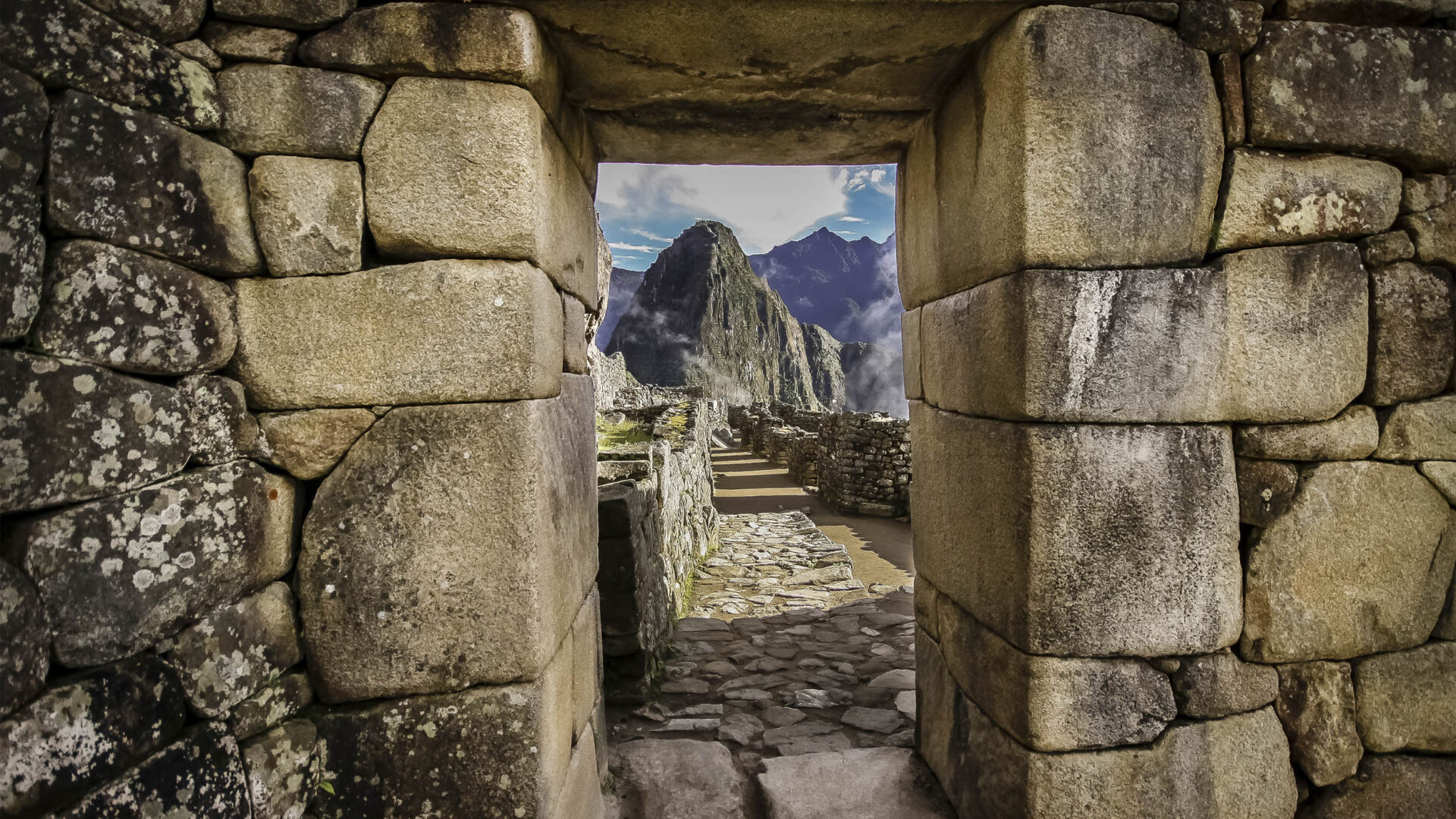 Multi City Vacation Packages: View through doorway at Machu Picchu Ruins
