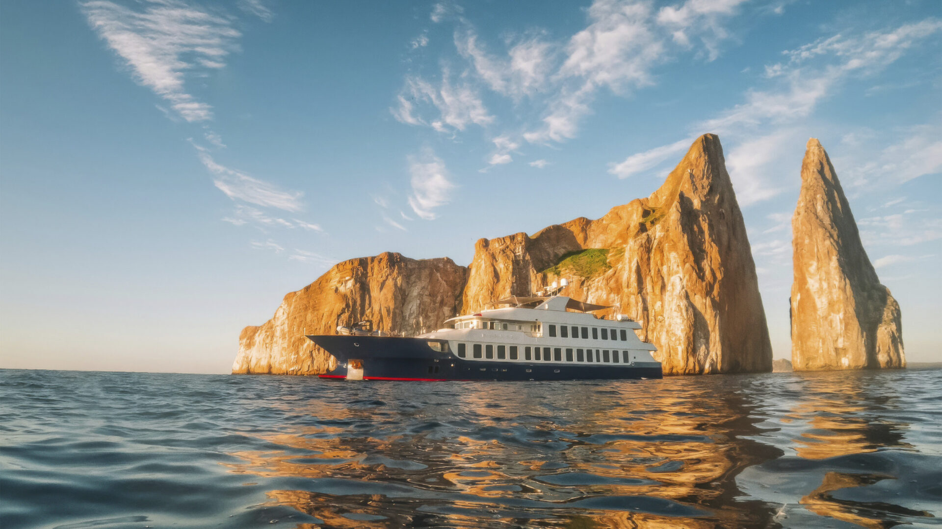 Galapagos yacht charter: Exterior view of Galapagos charter yacht at Kicker Rock.