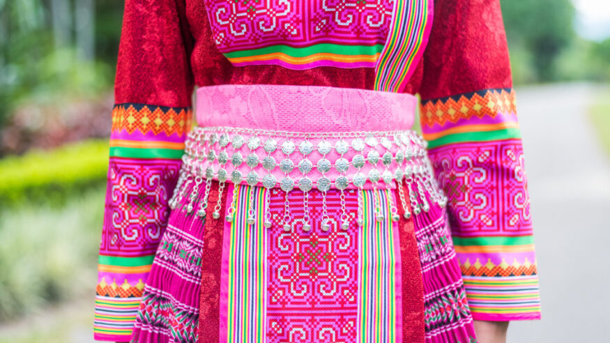 Mhong hill tribe woman on green background