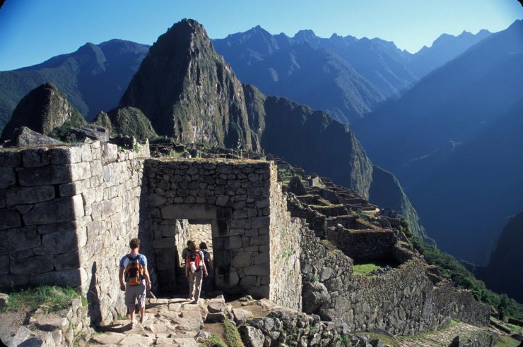 Hikers at the gate over Machu Picchu